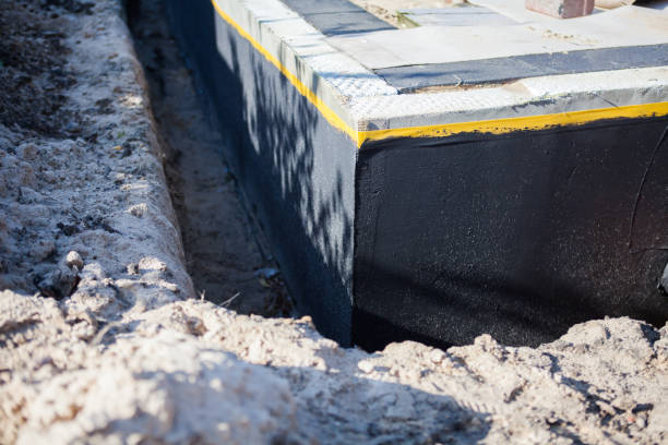 Professional Emergency Waterproofing technician working in Avon-by-the-Sea, NJ